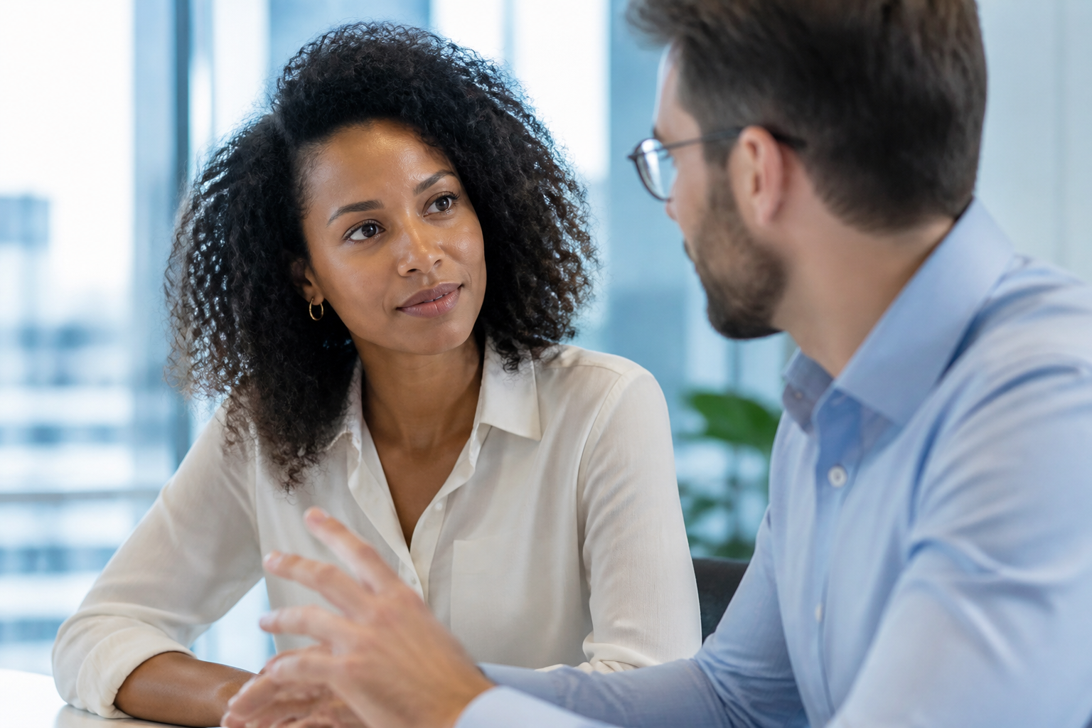 Two colleagues practicing a focused conversation